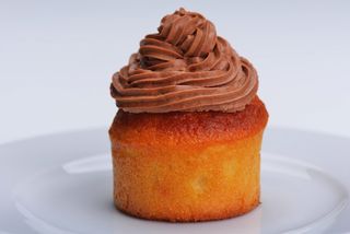 cupcake piled with chocolate icing