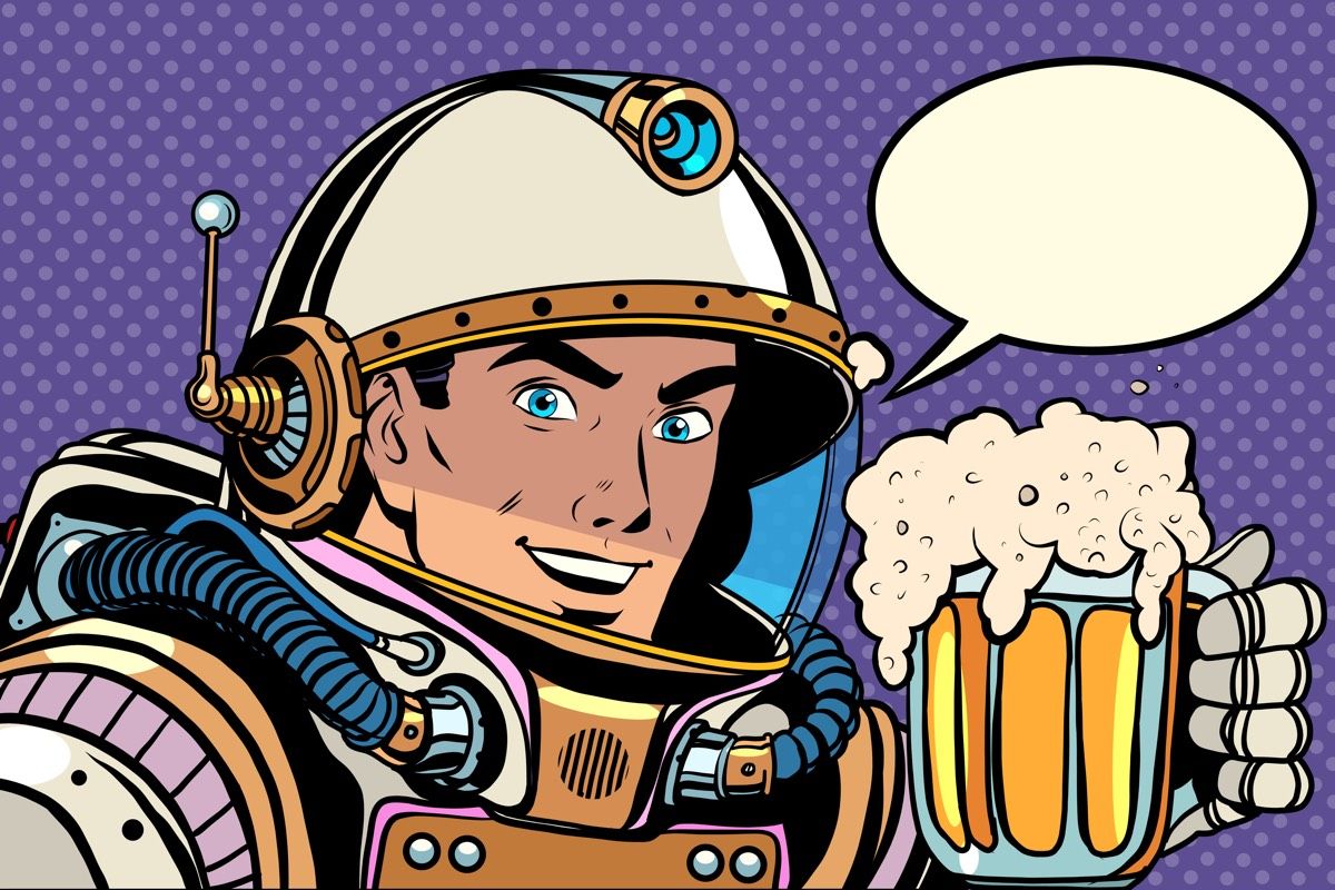 Retro astronaut and a mug of beer.