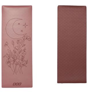 A brown copper colour yoga mat with moon and star designs.