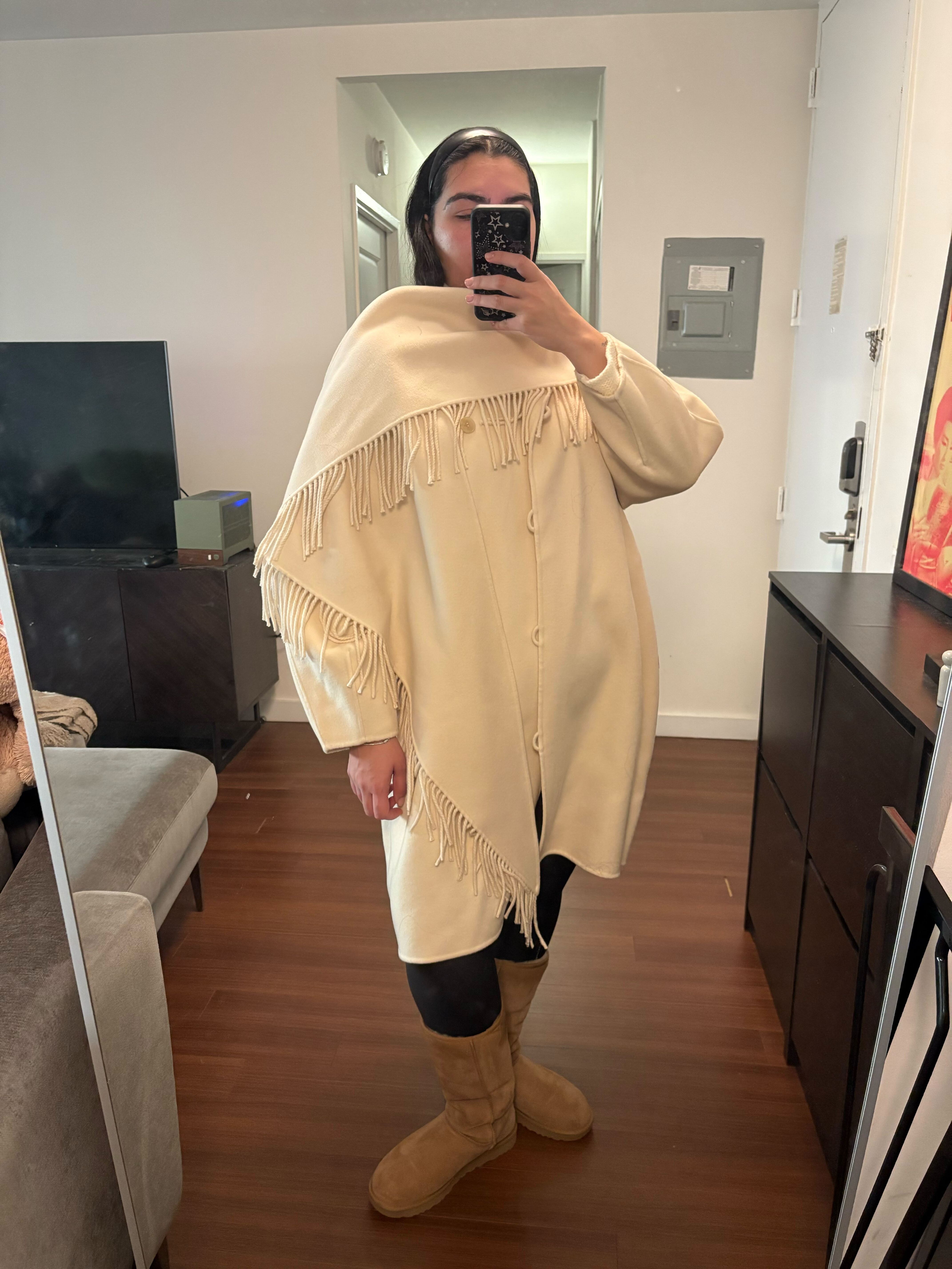 Who What Wear editor Ana Escalante wears tall UGG Boots.