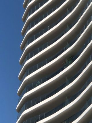 Detail of concrete balconies at Antares tower by Odile Decq in Barcelona