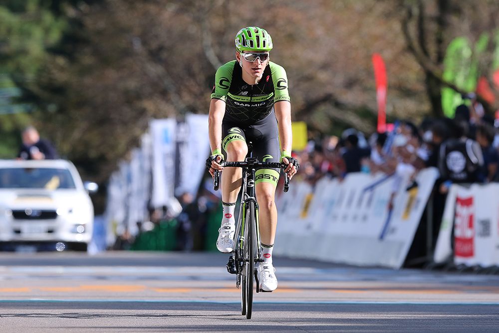 Matej Mohorič crosses the line for sixth