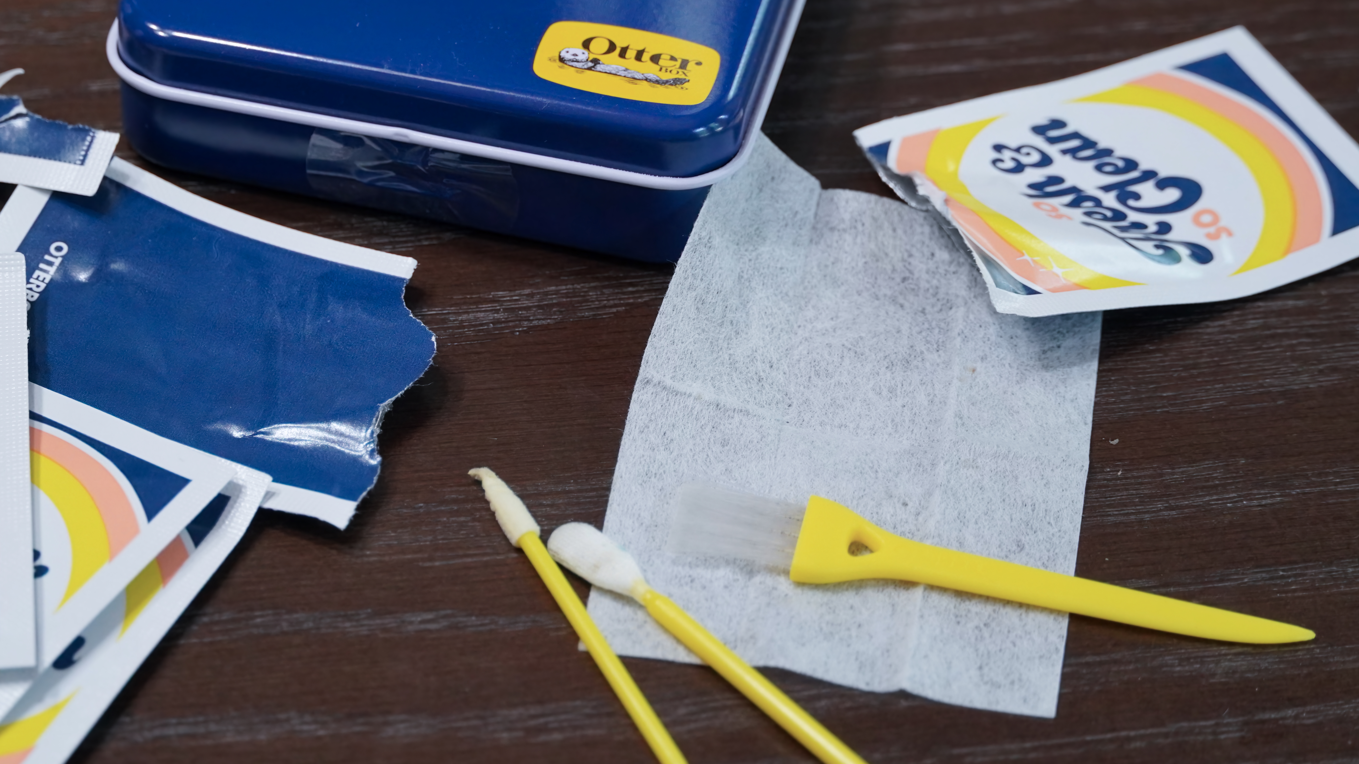 The small wipe and semi-broken cleaning tools of the Mobile Device Care Kit.