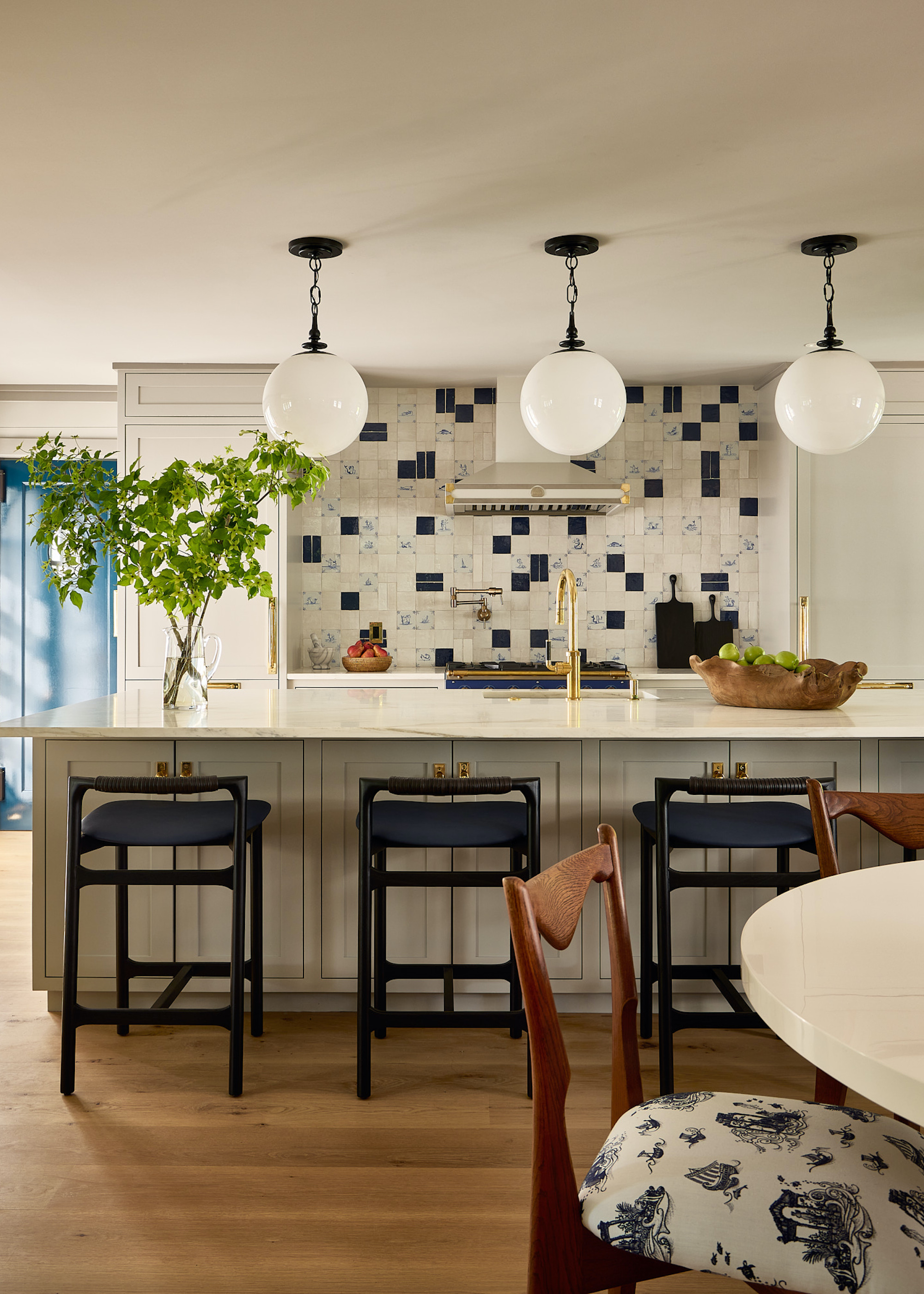 monochrome kitchen with wood floors