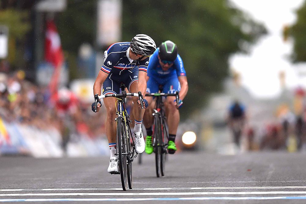 Kevin Ledanois (France) looks back to see how far ahead he is of silver medallist Simone Consonni (Italy)