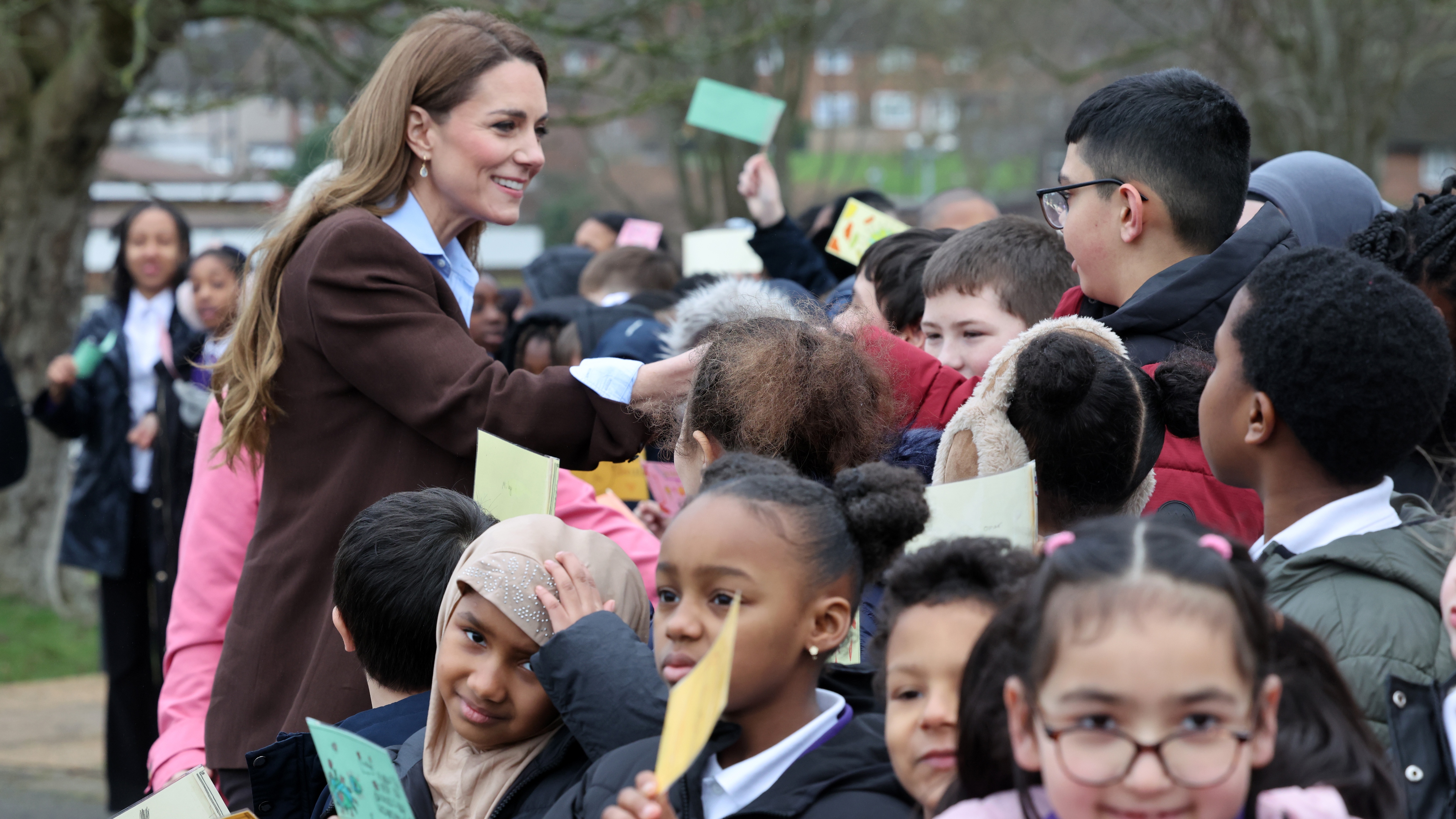 Catherine, Princess Of Wales greets people as she arrives to visit Castle Hill Academy in New Addington, Croydon to mark Children's Mental Health Week 2026