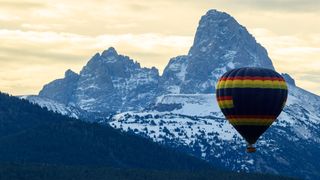 Hot air balloon with Grand Teton in background