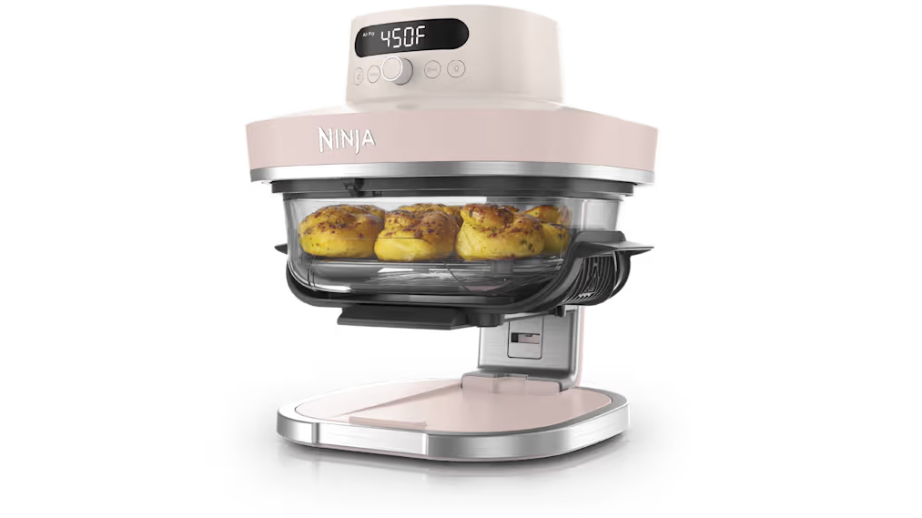Ninja Crispi Pro air fryer with bread rolls inside