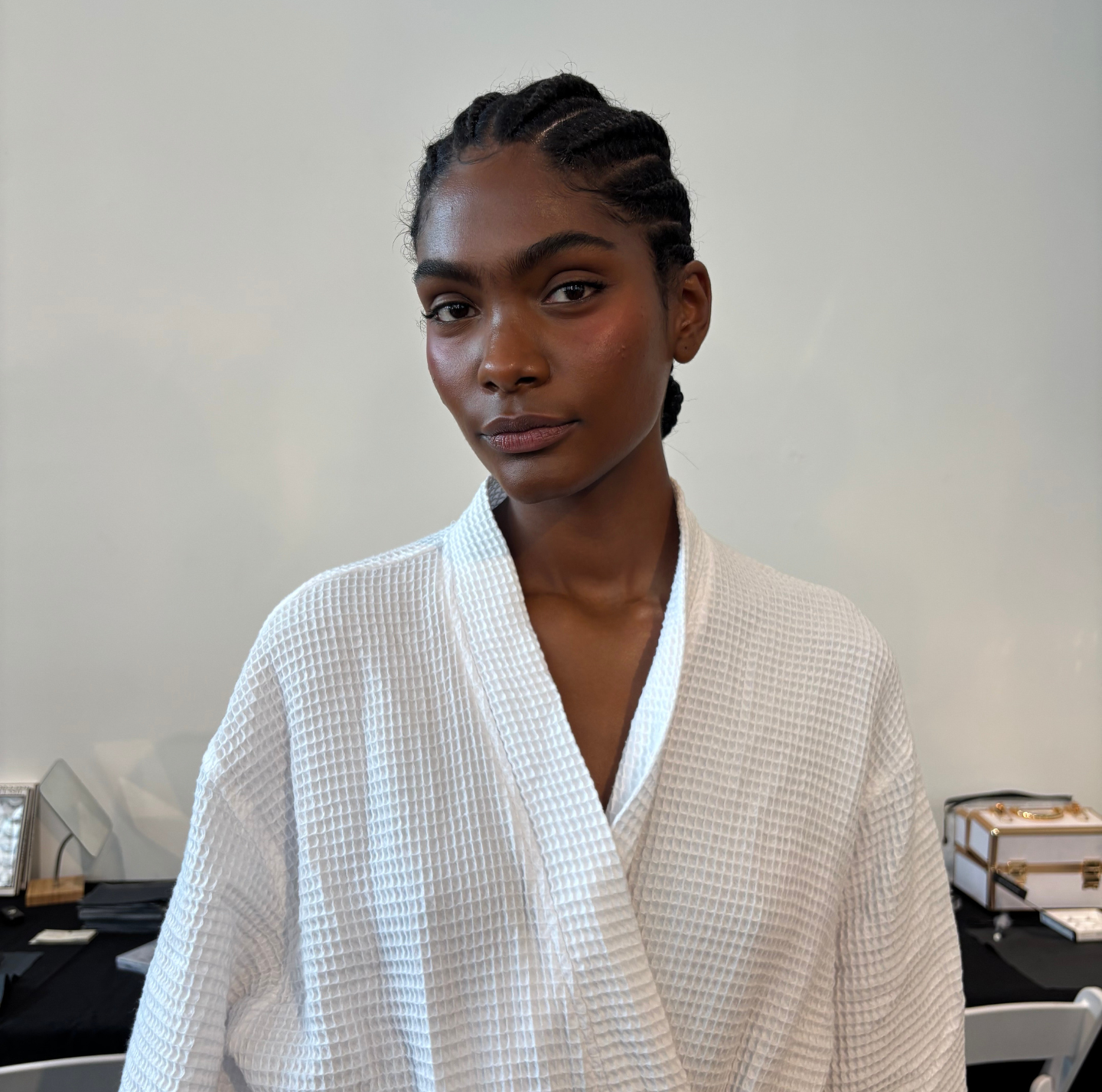 A model at the PatBO fashion show wearing Morphe&#039;s Cheek Thrills Multi-Finish Face Trio.