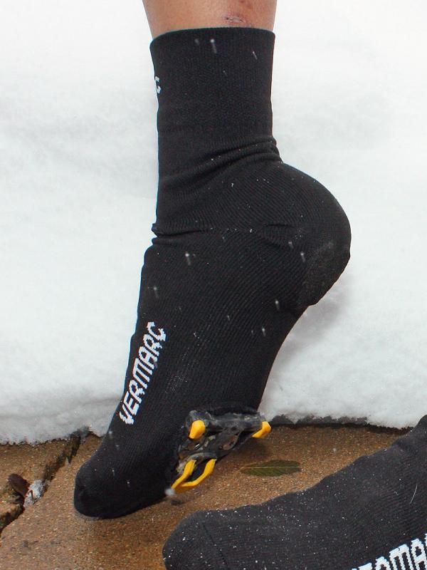 The cutout is big enough that the bootie won't interfere with most pedal systems but the heel and toe areas will ultiimately wear through once you start walking in them a bit.