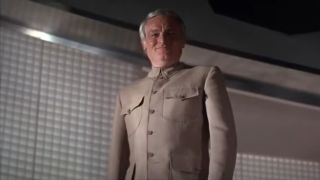 Charles Gray smiles smugly as he stands in Diamonds Are Forever.