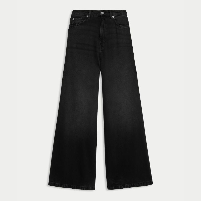 A cutout of black wide leg jeans by M&amp;amp;S