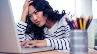 A Windows laptop user looking perplexed