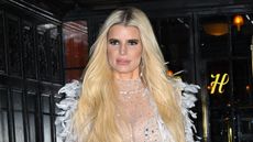 jessica simpson on a black background