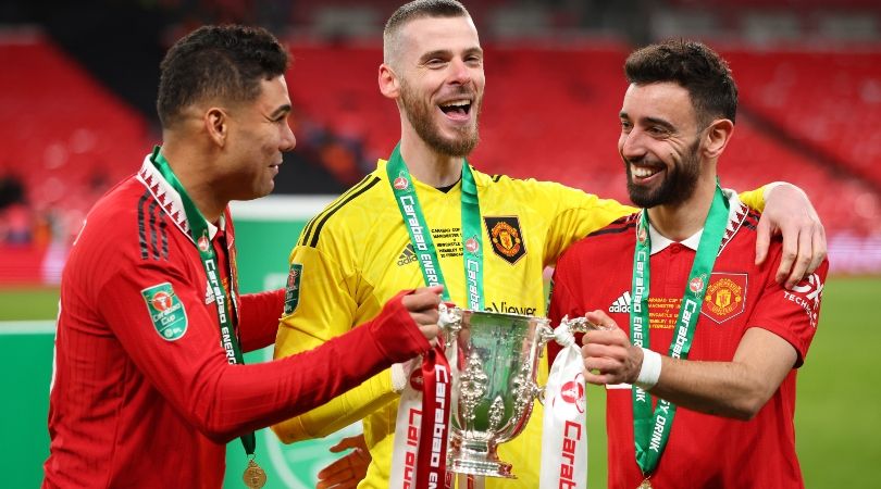 Casemiro, David De Gea and Bruno Fernandes celebrate with the Carabao Cup after Manchester United beat Newcastle at Wembley.