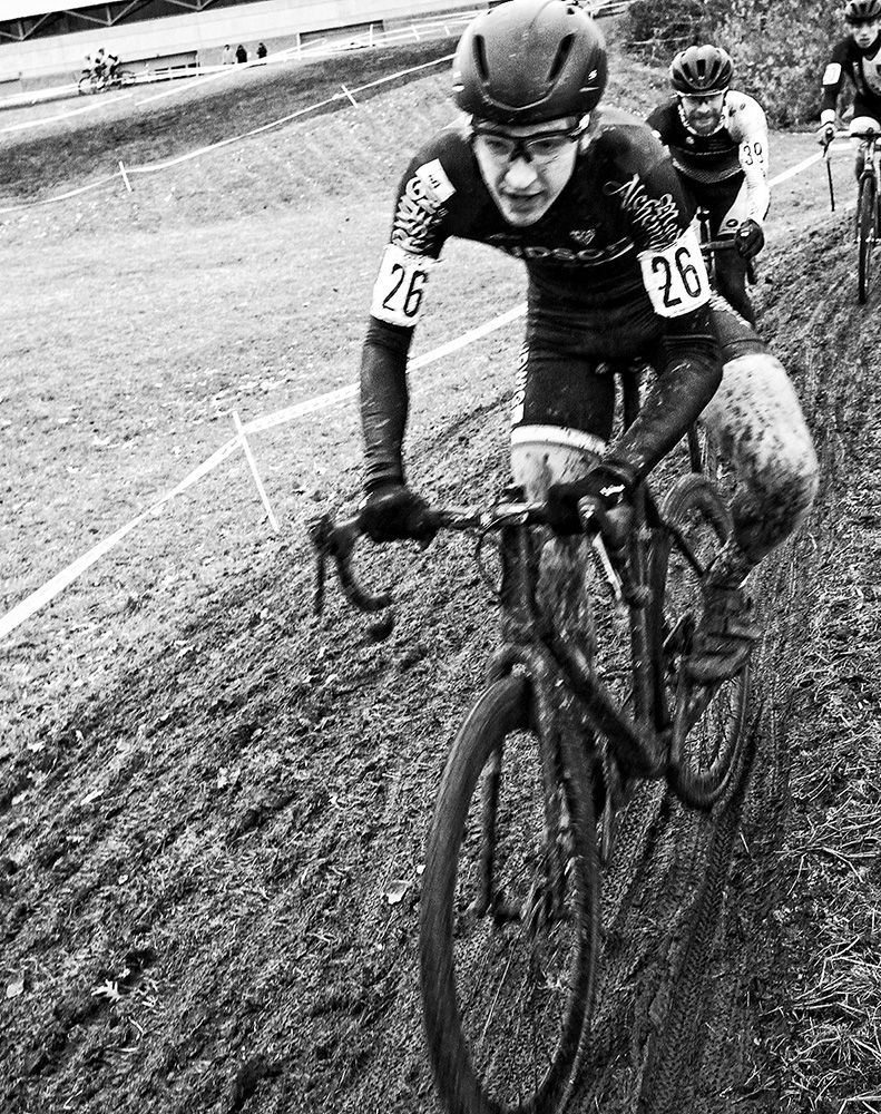 Kyle Murphy (Hudson/Ludwig &amp; Larsen Racing) leads a pack of riders on a technical section