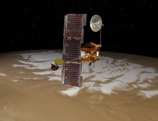 NASA's Mars Odyssey spacecraft passes above Mars' south pole in this artist's concept illustration. The spacecraft has been orbiting Mars since October 24, 2001. The spacecraft will serve as a vital relay for NASA's Mars rover Curiosity's landing on Aug. 5, 2012. [Related: <a href=http://www.space.com/16385-curiosity-rover-mars-science-laboratory.html>Mars Rover Curiosity Landing Coverage</a>]