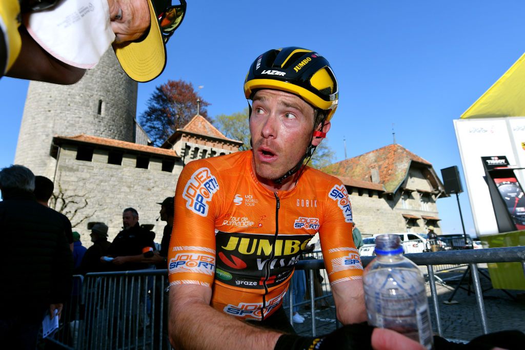 ROMONT SWITZERLAND APRIL 27 Rohan Dennis of Australia and Team Jumbo Visma orange points jersey reacts after cross the finishing line during the 75th Tour De Romandie 2022 Stage 1 a 178km stage from La Grande Beroche to Romont 777m TDR2022 on April 27 2022 in Romont Switzerland Photo by Dario BelingheriGetty Images