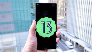 Android 13 logo on a smartphone