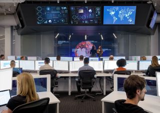 People sitting in an open office setting