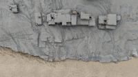 TOPSHOT - An aerial view shows houses lying deluged in sludge after flash floods at Devighat, Bidur Municipality in Nepal's Nuwakot district on August 27, 2026. Nepal's disaster agency said that 823 people remained out of contact on August 27, more than 24 hours after a deadly flood tore through the border region with Tibet. (Photo by Prabin RANABHAT / AFP via Getty Images)