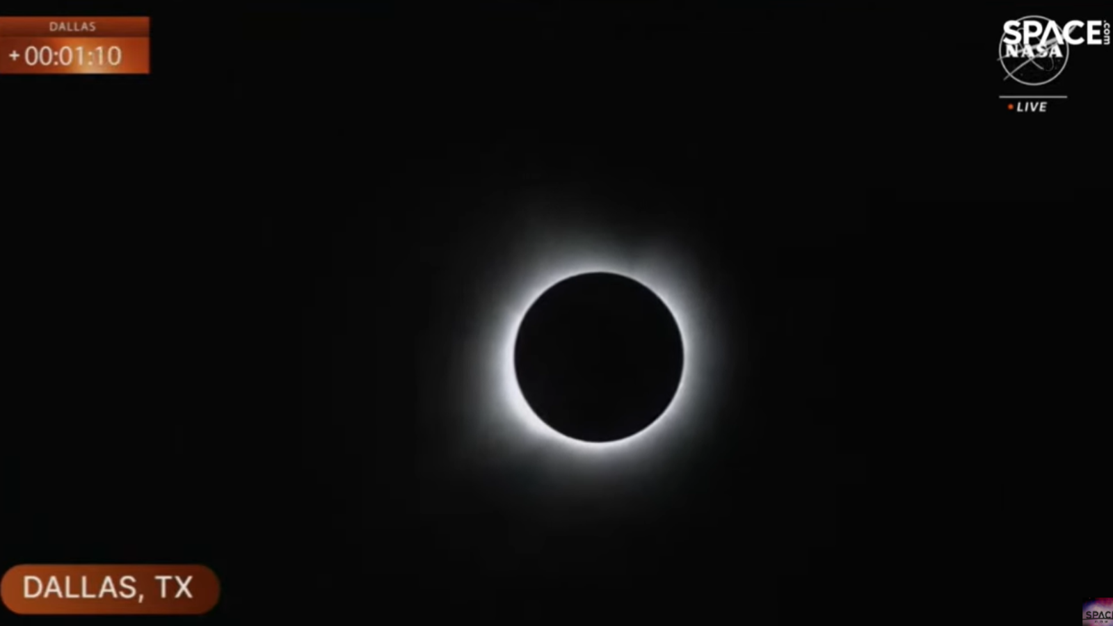 Totality over Dallas Texas with the solar corona strikingly visible as white streamers from the sun
