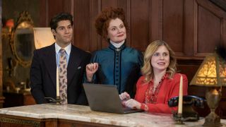 Trevor, Hetty, and Sam in the lobby of the bed and breakfast in Ghosts Season 3x10