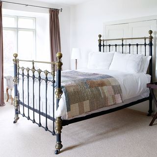 guest bedroom with carpet floor