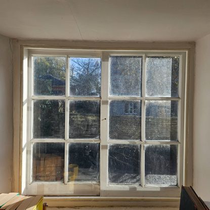 white cottage style window with secondary glazing