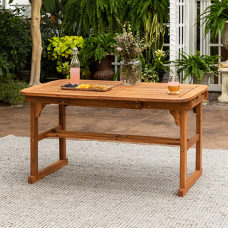 Outdoor extendable dining table