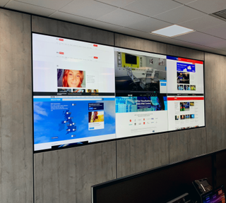 VuWall video wall solutions set up in a control room help monitor cybersecurity issues.