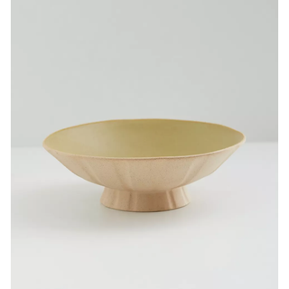 stoneware serving bowl with standing design 