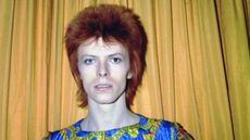 david bowie on a yellow background