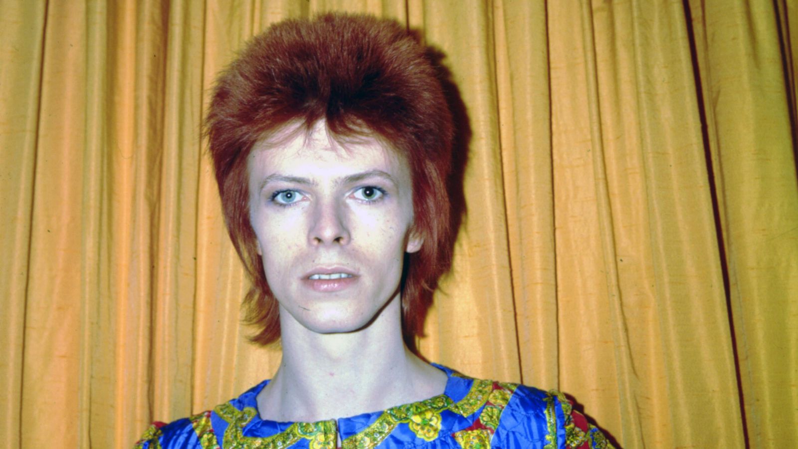 david bowie on a yellow background