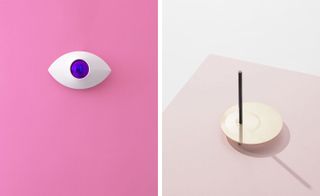 Split picture with one side pink with a white eye and the other side showing table with abstract sculpture on