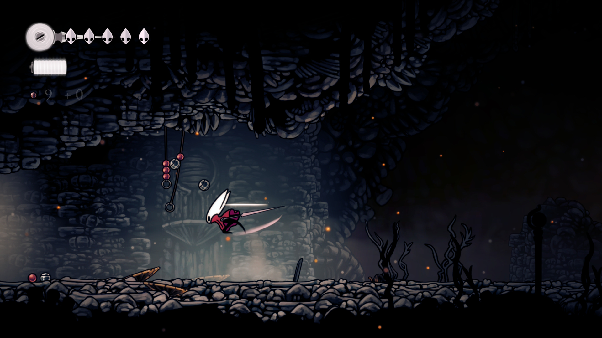 Hornet slashes hanging rosary beads in Hollow Knight: Silksong