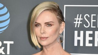Charlize Theron with 70s makeup