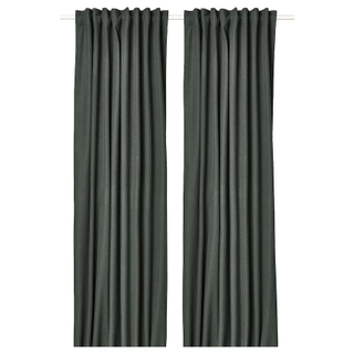 A pair of dark green curtains