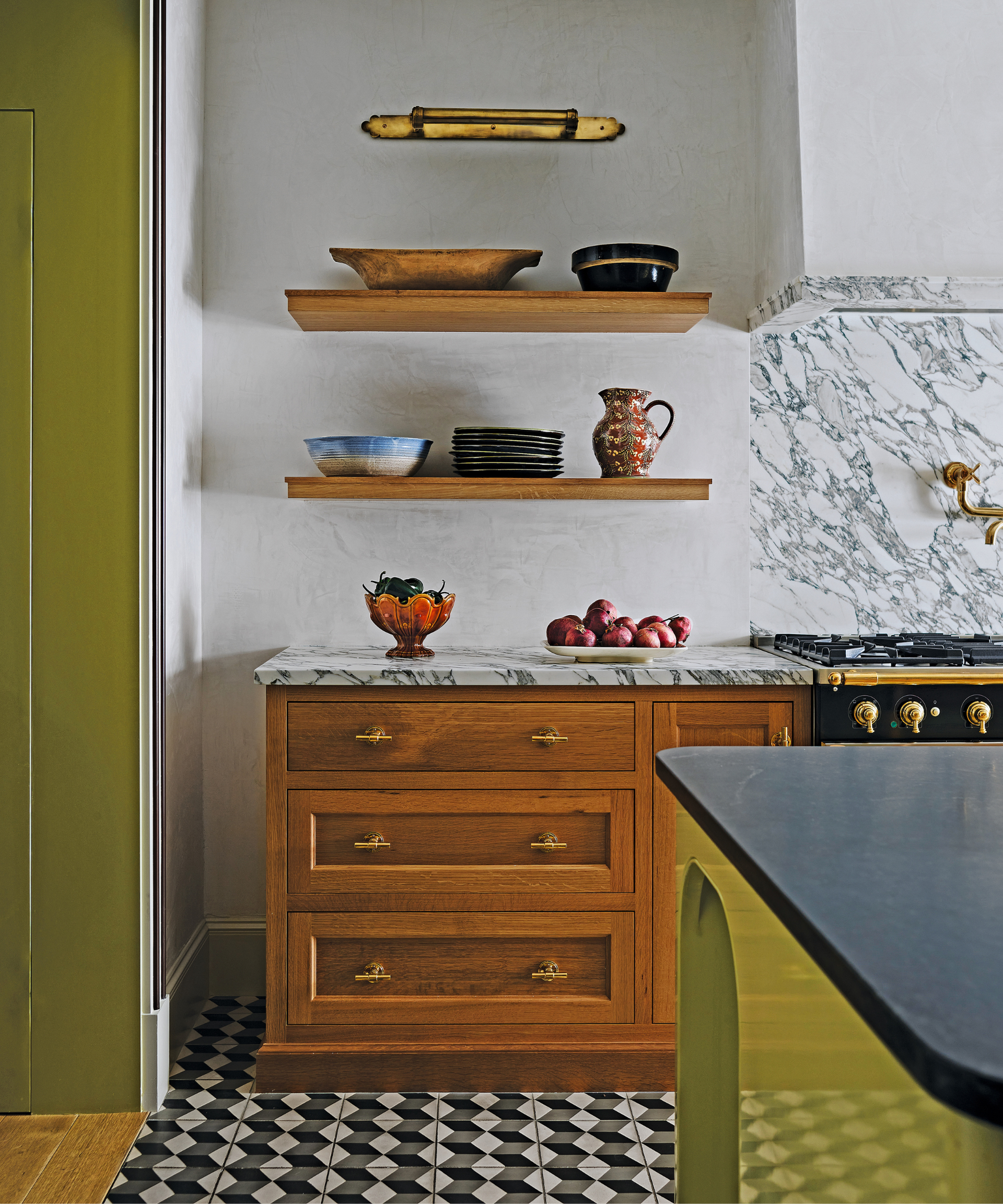 green contemporary kitchen in boston home with grey marble and shelves