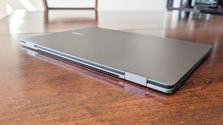 The Samsung Galaxy Book5 Pro 360 closed on a table.