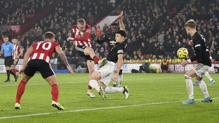 Sheffield United striker Oli McBurnie scored a late equaliser in the 3-3 draw with Manchester United