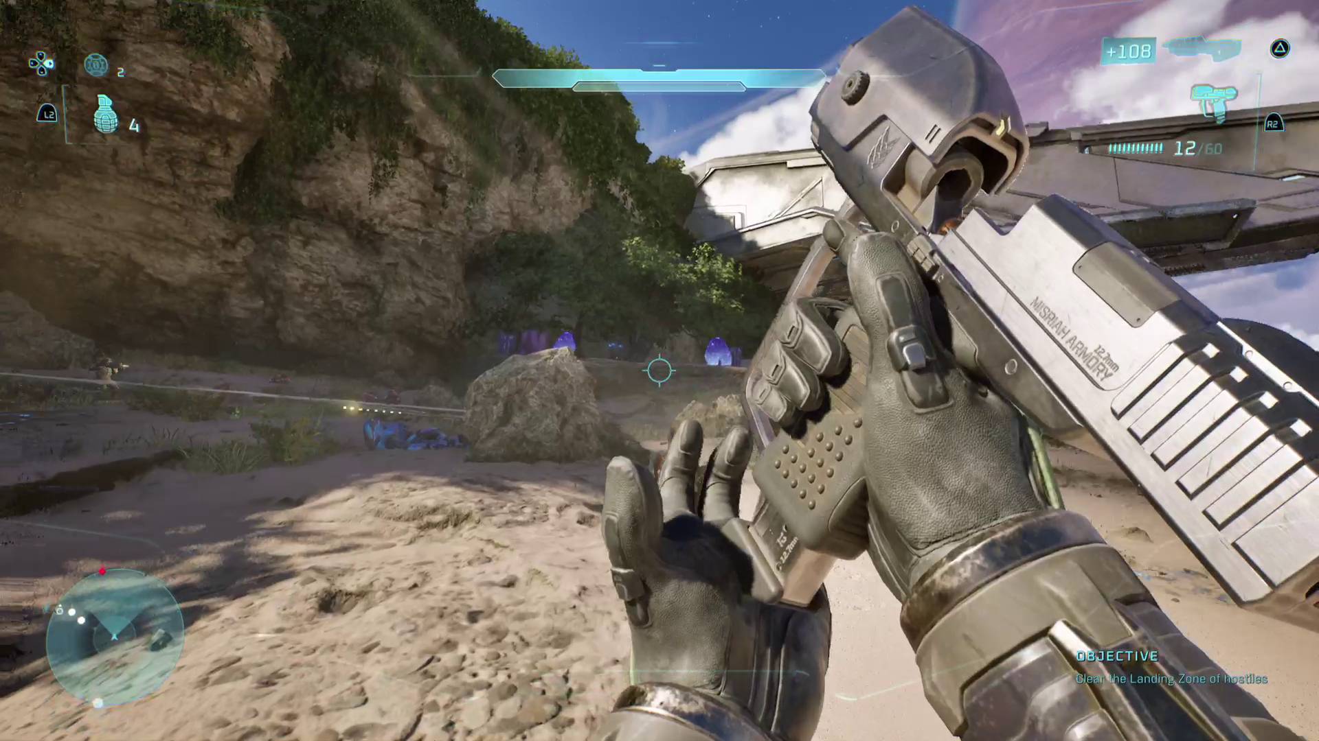 Halo: Campaign Evolved player reloading magnum pistol while storming the beach in the Silent Cartographer