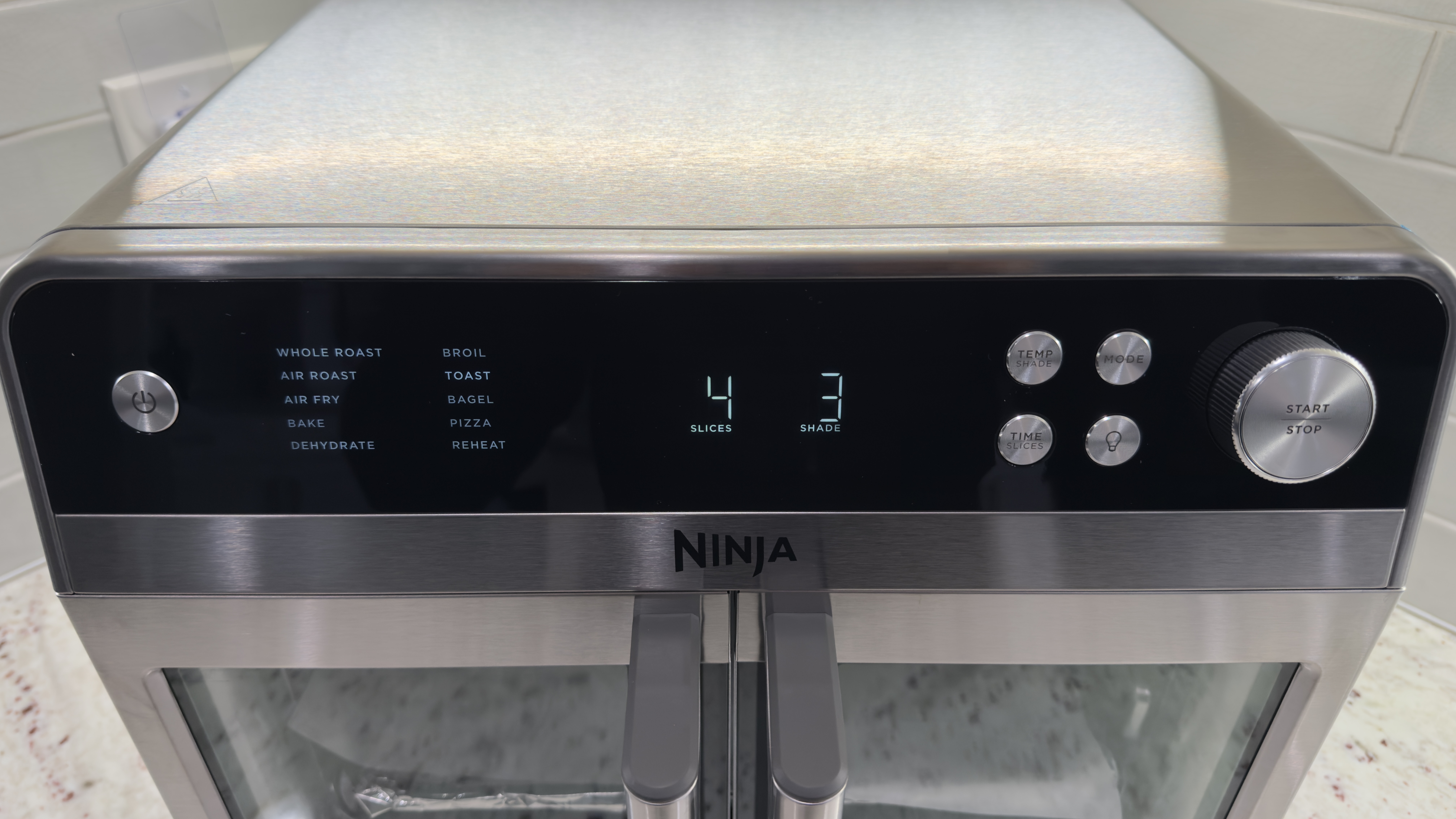 Ninja French Door Air Fryer and Countertop Oven close up of control panel