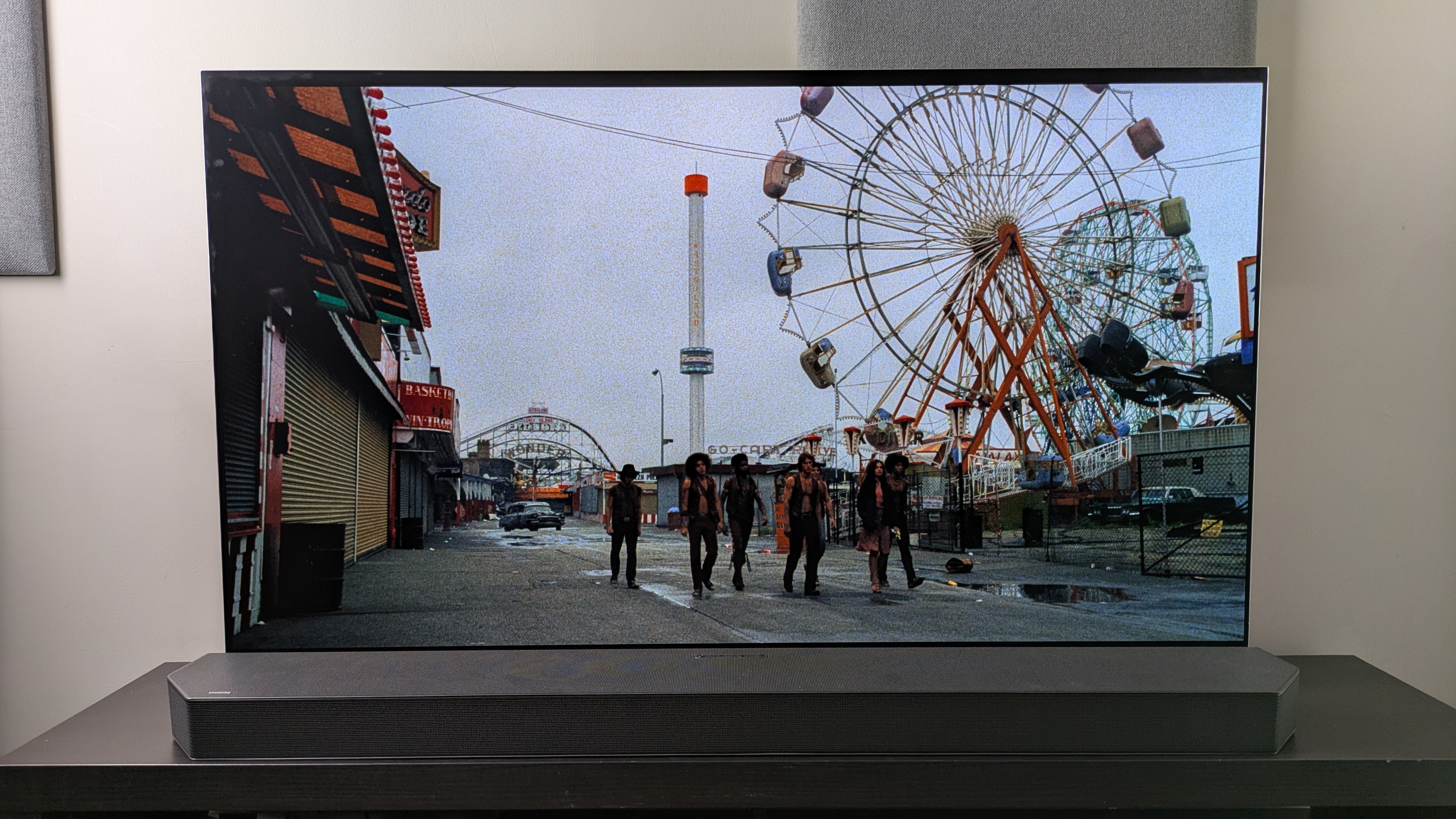 The Warriors 4K Blu-ray Arrow version on LG G5 showing The Warriors walking through funfair in the day 