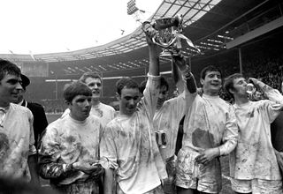 Swindon Town players celebrate with the League Cup after winning the 1969 final against Arsenal