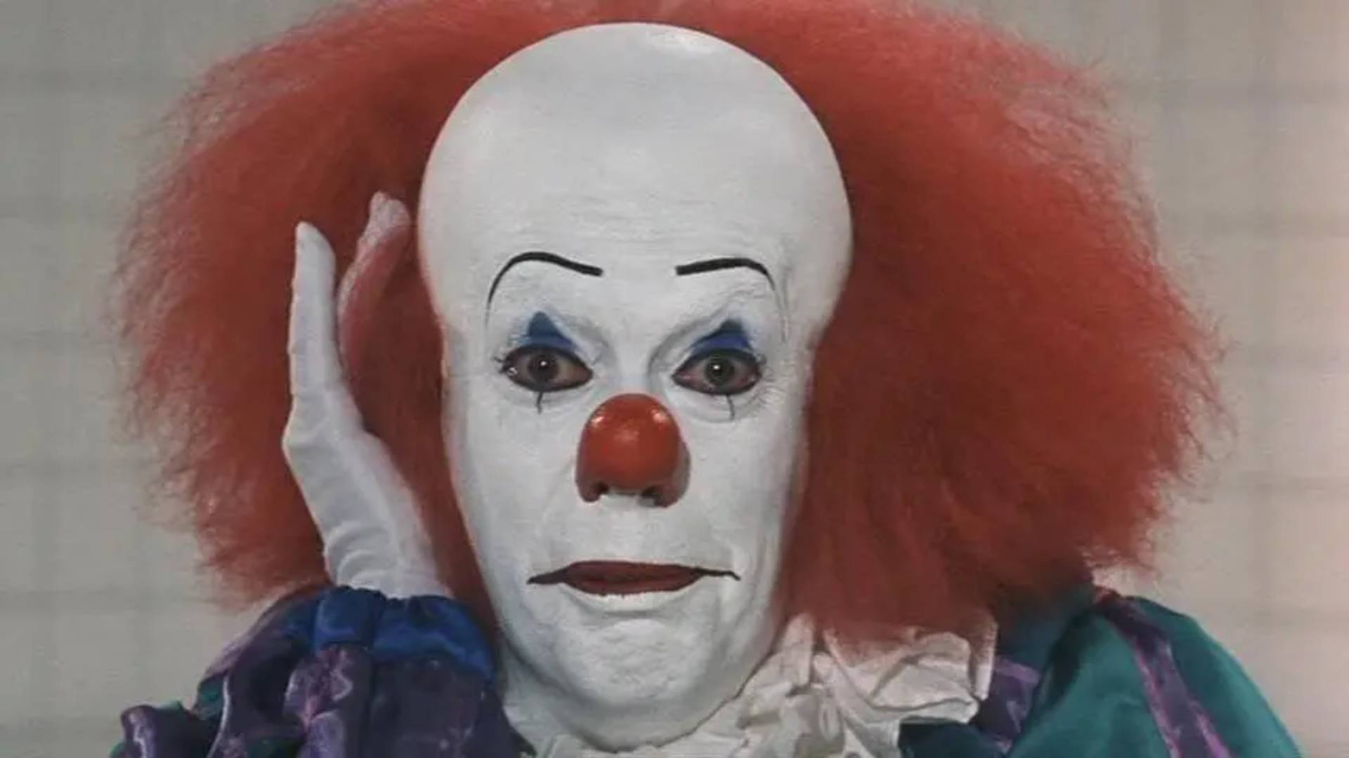 Tim Curry as Pennywise in IT