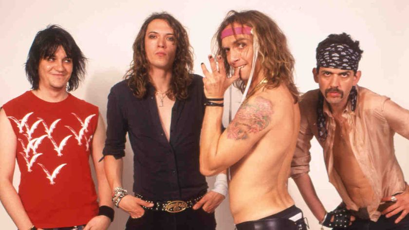 The Darkness posing for a photograph in 2004