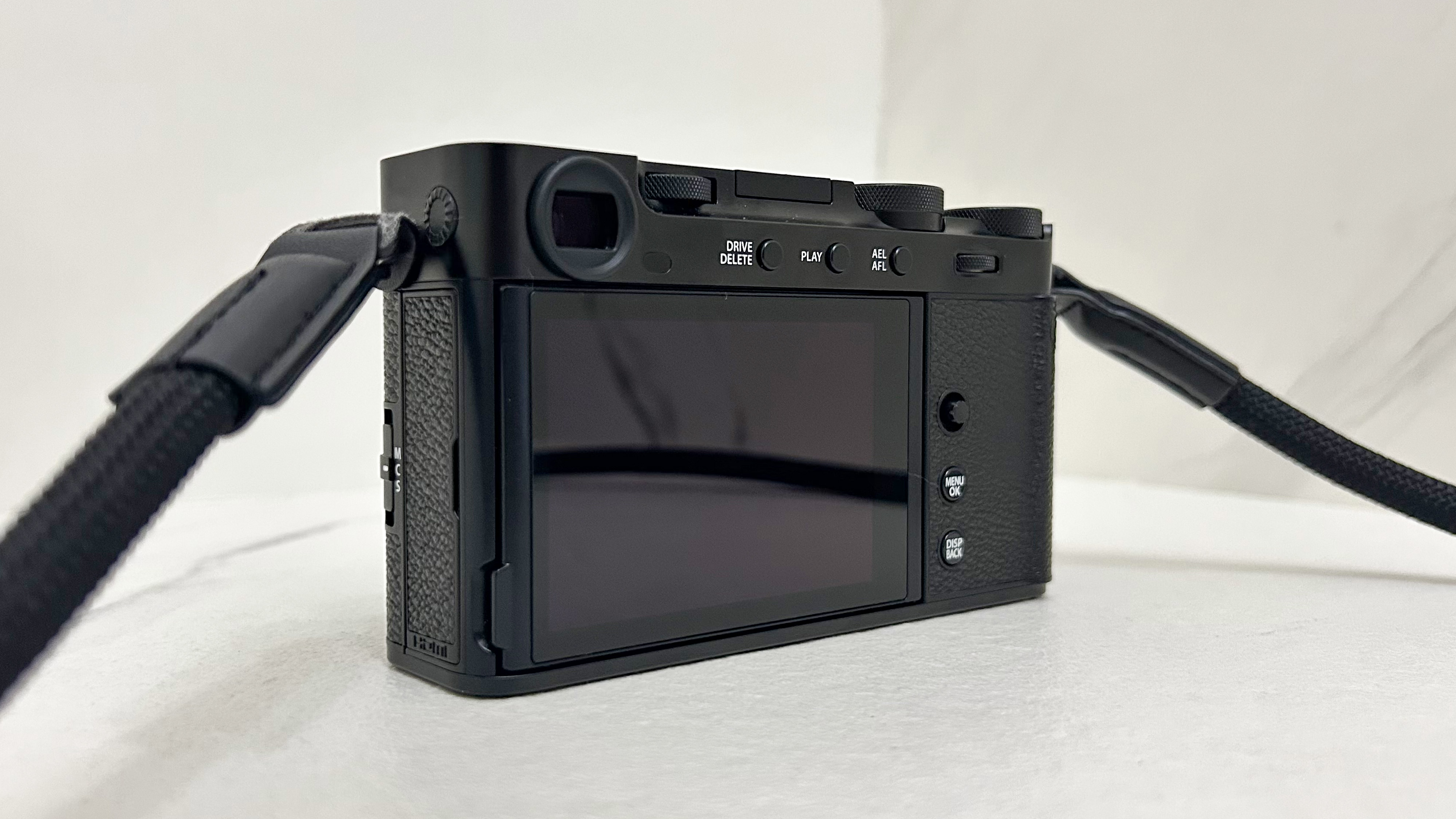 LCD screen of the new Fujifilm X-E5 film simulation camera photographed in front of a black background.