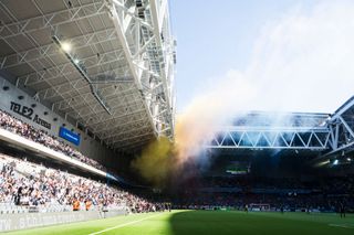 General view of Tele2 Arena as smoke rises out of the stadium during the Svenska Cupen Final between Djurgardens IF and Malmo FF at Tele2 Arena on May 10, 2018 in Stockholm, Sweden.