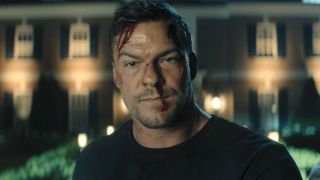 Reacher with a bloody forehead and bloody lip in Reacher Season 3 finale
